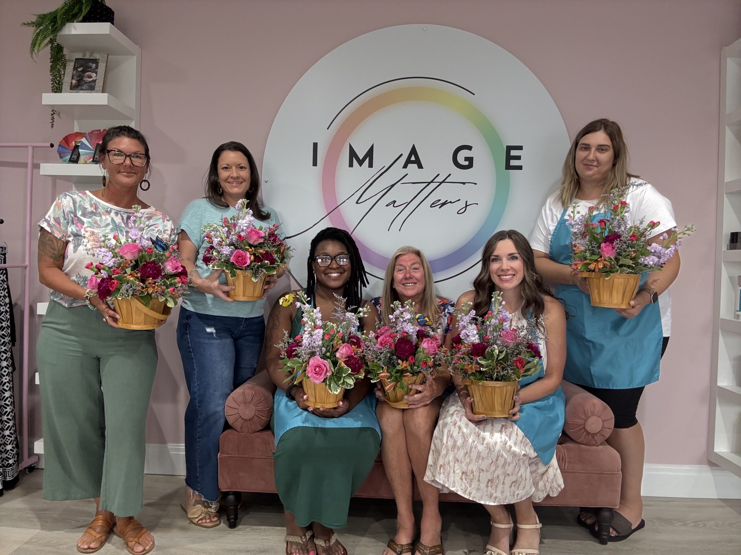 image matters floral event image of ladies with floral arrangements